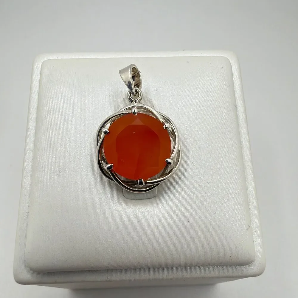 NWOT 12mm, round cut, faceted Carnelian pendant in sterling silver!